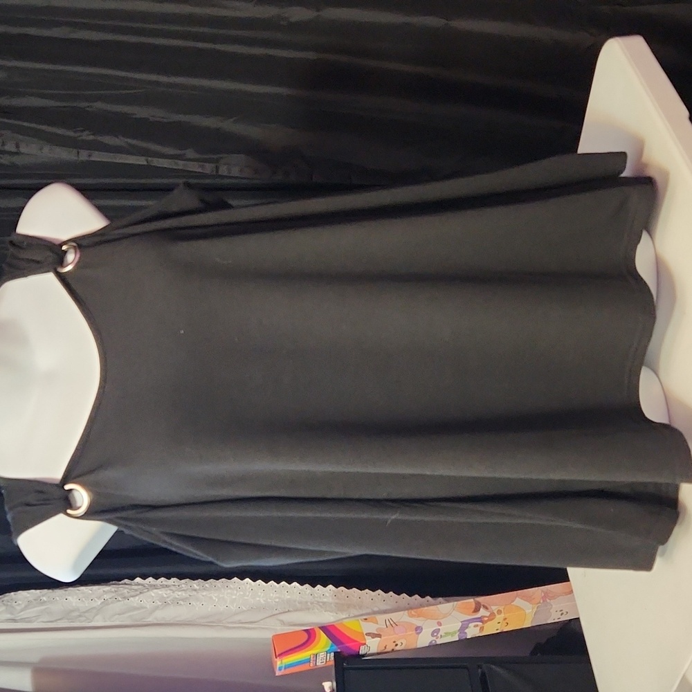 Elegant Black Longsleeve Top with Ring Accents